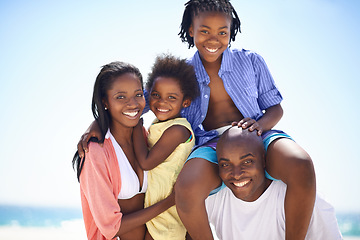 Image showing Black family, parents and kids with portrait on beach for adventure, holiday or vacation in summer. African people, face and smile outdoor in nature for break, experience or bonding with relationship