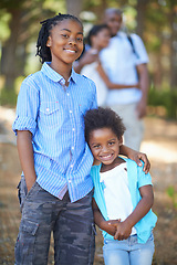 Image showing Portrait, brother and sister hiking in the forest together with their parents for travel, freedom or adventure. Black family, nature or environment with a young boy and girl sibling in the woods