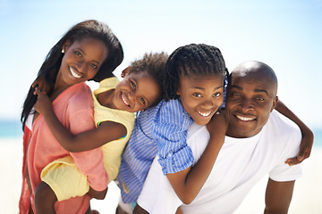 Image showing Black family, parents and kids with piggyback on beach for adventure, holiday or vacation in summer. African people, face or smile outdoor in nature for break, experience or bonding with relationship