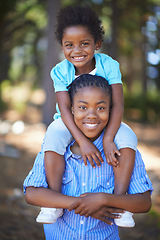 Image showing Children, smile and portrait of piggyback outdoor, care or bonding together. Face, African kids and brother carrying sister in nature, family playing in forest or park, love of siblings and summer