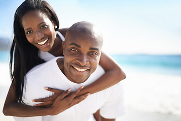 Image showing Piggyback, smile and portrait of black couple at the beach for valentines day vacation, holiday or adventure. Happy, love and African man and woman on a date by the ocean on weekend trip together.