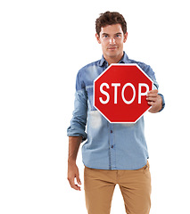 Image showing Portrait, man and traffic stop sign in studio isolated on a white background mockup space. Person show red octagon symbol, forbidden warning signal and caution, attention and security in protection