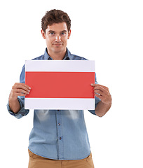 Image showing Paper, poster and portrait of man in studio advertising space, news or presentation on white background. Banner, mockup and face of male model with checklist, schedule or platform, deal and offer