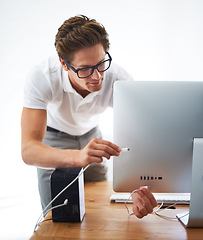 Image showing Computer, man and technician on cable connection, hardware and repair digital desktop. Pc, engineer and plug wire on port of electronics, nerd fixing system and information technology professional