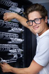 Image showing Server room, information technology and man in portrait for connectivity, night and job. Cybersecurity system, it network or person for fiber internet, data center and storage with cable connection