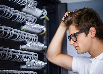 Image showing Server room, thinking and confused man with cables for connectivity, night and check hardware. Cybersecurity system, it network and technician for glitch, data center and problem solving for error