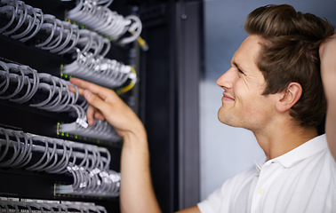 Image showing Server room, confused man and check cables with thinking for connectivity, night and hardware. Cybersecurity system, it network and technician for glitch, data center and problem solving for error