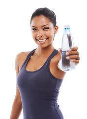 Image showing Woman, water and smile in portrait for fitness, studio and liquid for health and wellness. Happy athlete, female person and pride on face for hydration, weight loss and detox by white background