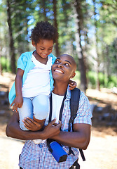 Image showing Happy father, hiking and carrying child in forest for family bonding, fresh air or exploring together in nature. Dad with kid on shoulders smile in holiday adventure, weekend or outdoor trip in woods