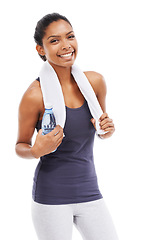 Image showing Woman, fitness and portrait with bottle, towel and smile for exercise, workout and training in studio on white background. Happy african athlete with water for hydration, wellness and healthy sports