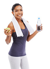 Image showing Portrait, water bottle and woman with apple for healthy food, nutrition or hydration after fitness, exercise or workout. Studio, liquid and thirsty African person with diet fruits on white background