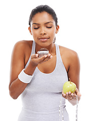 Image showing Woman, cake and fruit choice diet or smell dessert for weight loss, nutrition decision or balance food. Female person, temptation and tape measure for goals mockup space, white background or studio