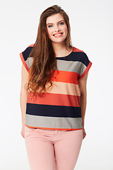 Image showing Portrait, fashion and happy woman in studio with stylish, fashionable or cool clothing on white background. Style, smile and female model pose in trendy clothes, edgy or outfit with positive attitude