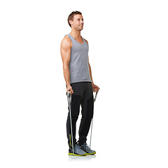 Image showing Health, man and resistance band for fitness in studio, gym and commitment for strong muscles with biceps. Sports person, exercise and workout for wellness in mockup and stretching on white background