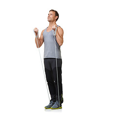 Image showing Stretching, man and resistance band to workout in studio, gym and bicep training to strong or muscle sculpt. Sports person, smile and exercise for commitment in mockup and fitness on white background