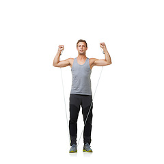 Image showing Fitness, man and resistance band for strong in studio, gym and bicep exercise for training muscles. Sports person, workout and commitment with stretching in mockup and cardio on white background