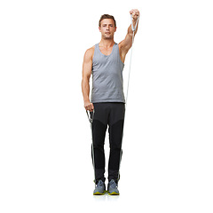 Image showing Portrait, man and stretching a resistance band in studio, gym and workout fitness for strong muscles. Sports person, face and exercise in commitment by equipment and mockup on white background