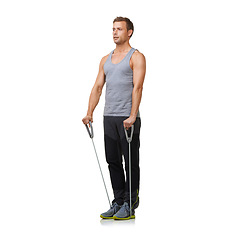 Image showing Fitness, man and resistance band for strong in studio, gym and biceps training or workout muscles. Sports person, exercise and commitment with stretching in mockup and cardio on white background