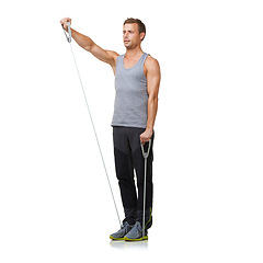 Image showing Fitness, person and resistance band to workout in studio, gym and bicep training for strong muscles. Sport, man and exercise for commitment in gym equipment and mockup for cardio by white background