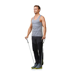 Image showing Strong, man and resistance band to workout in studio, gym and biceps training for health muscles. Sports person, exercise and commitment with stretching in mockup and wellness on white background