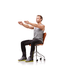 Image showing Office chair, man and exercise for posture with health and fitness in white background or studio. Sitting, workout and person training with seat and stretching arms in practice for core wellness