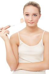 Image showing Makeup, foundation and unhappy woman with portrait for beauty, skincare and cosmetics in studio. Sad, frustrated and female person with skin issue and problem from face product with white background
