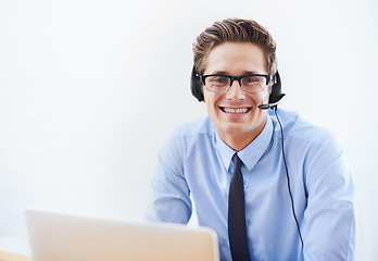 Image showing Business man, call center portrait and computer for virtual communication, customer service or support. Professional agent, consultant or advisor with FAQ or contact us on a wall or white background