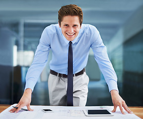 Image showing Architect, man and smile in portrait, blueprint and project management or designing floor plan in office. Male professional, construction and contractor for home renovation or real estate buildings