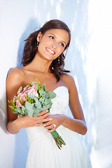 Image showing Happy, wedding and young woman with flowers for luxury marriage ceremony, party or reception. Smile, love and beautiful bride from Mexico with makeup and floral bouquet for romantic celebration.