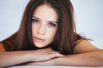 Image showing Serious, makeup and portrait of young woman with beauty, cosmetic and natural routine. Glow, glamour and headshot of beautiful female person from Canada with positive, good and confident attitude.