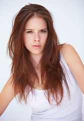 Image showing Portrait, serious and woman in studio with attitude, confidence or mindset against a white background. Hair fail, face and female model with haircare mistake, damage or unexpected haircut or color
