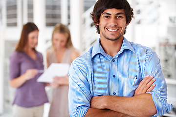 Image showing Happy, crossed arms and portrait of business man with team for leadership, confidence and pride. Creative agency, company and worker with staff for meeting, planning and collaboration in office