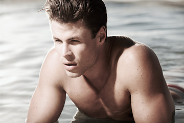 Image showing Man, face and thinking with swimming in pool for health, wellness or break from workout. Male swimmer, determination and idea for fitness, routine and exercise for strength in cardio for competition