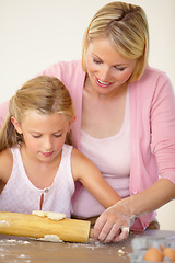 Image showing Dough, rolling pin or baking family, child and mom teaching youth, daughter or girl to prepare dessert, food or recipe. Kitchen, support or young kid learning home cooking together with mother