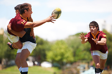 Image showing Rugby game, men and tackle during sport practice on a green field outdoors for fitness. Exercise, athlete and male people with teamwork and professional player with a workout in uniform