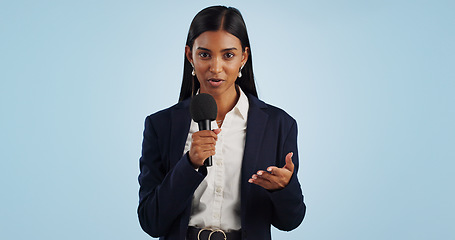 Image showing Woman, portrait or presenter in studio talking, speaking on talk show or media on blue background. Breaking news, tv press or Indian reporter presenting live global political events with microphone