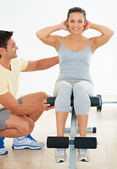 Image showing Personal trainer, woman and gym machine for crunch and fitness workout. Instructor, coach and healthy people with exercise equipment for strong body and athletic training for active lifestyle