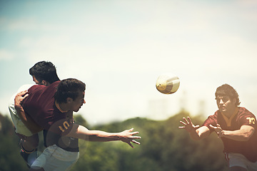 Image showing Rugby game, men and pass during sport practice on a green field outdoors for fitness. Tackle, athlete and male people with teamwork and training professional player with a workout in uniform