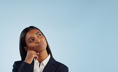 Image showing Thinking, solution or businesswoman in studio for problem solving or space on blue background. Ideas, doubt or decision with an attorney or lawyer contemplating a thought, choice or legal option