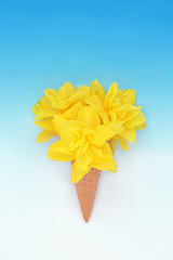Image showing Surreal Ice Cream Cone with Spring Daffodil Flowers  