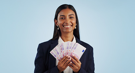 Image showing Business woman, portrait and money fan in financial freedom against a blue studio background. Happy face of female person or employee with cash, savings or investment for bonus salary on mockup space