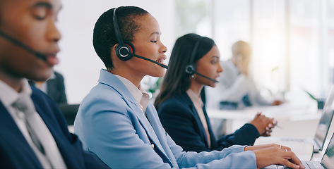 Image showing Business people, telemarketing and customer service with conversation, black woman or tech support. Staff, group or professional with headphones, office or internet with crm, call center or help desk