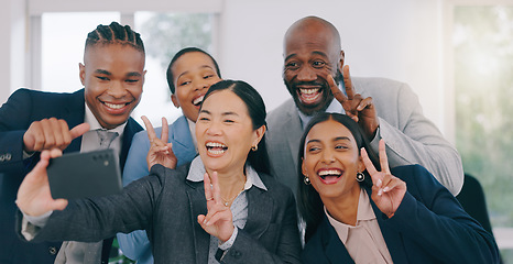 Image showing Goofy, selfie and happy business people in office for team building or bonding together. Silly, diversity and group of professional work friends taking a picture with funny face at modern workplace.