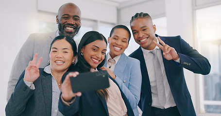 Image showing Smile, selfie and happy business people in the office for team building or bonding together. Peace sign, diversity and group of professional work friends taking a picture at modern workplace.