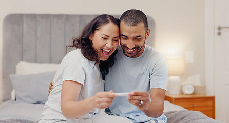 Image showing Excited couple, bed and positive pregnancy test for maternity, responsibility or family at home. Happy man and pregnant woman smile for parenthood, morning or good news or results in bedroom at house