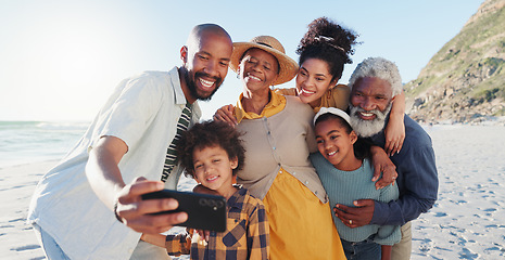 Image showing Love, selfie and happy family at a beach for travel, fun or adventure in nature together. Ocean, profile picture and African kids with parents and grandparents at the sea for summer, vacation or trip