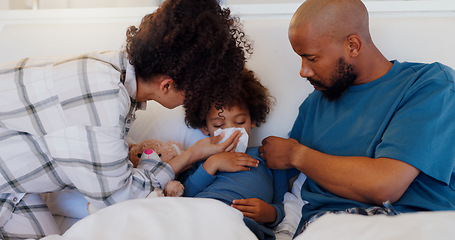 Image showing Mother, father and sick child in bed blowing nose for virus, infection or disease in care or support at home. Mom, dad and kid with flu, cold or symptoms for allergies, sinus or morning in bedroom