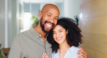 Image showing African couple, smile and hug at front door in portrait with pride, care and bonding at new home. Man, woman and happy together with embrace, love and investment with property, real estate or house