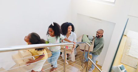 Image showing African family, children and boxes in new home, excited and helping on stairs with parents for fresh start. Father, mother and kids with moving, cardboard package or happy on steps, property or house