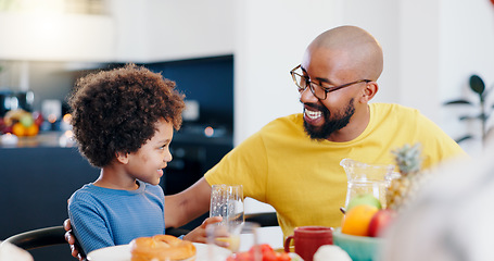 Image showing Black family, food and father with child for breakfast, lunch and eating together in home. Happy, talking and dad and boy at table for bonding with meal for health, nutrition and hunger in house